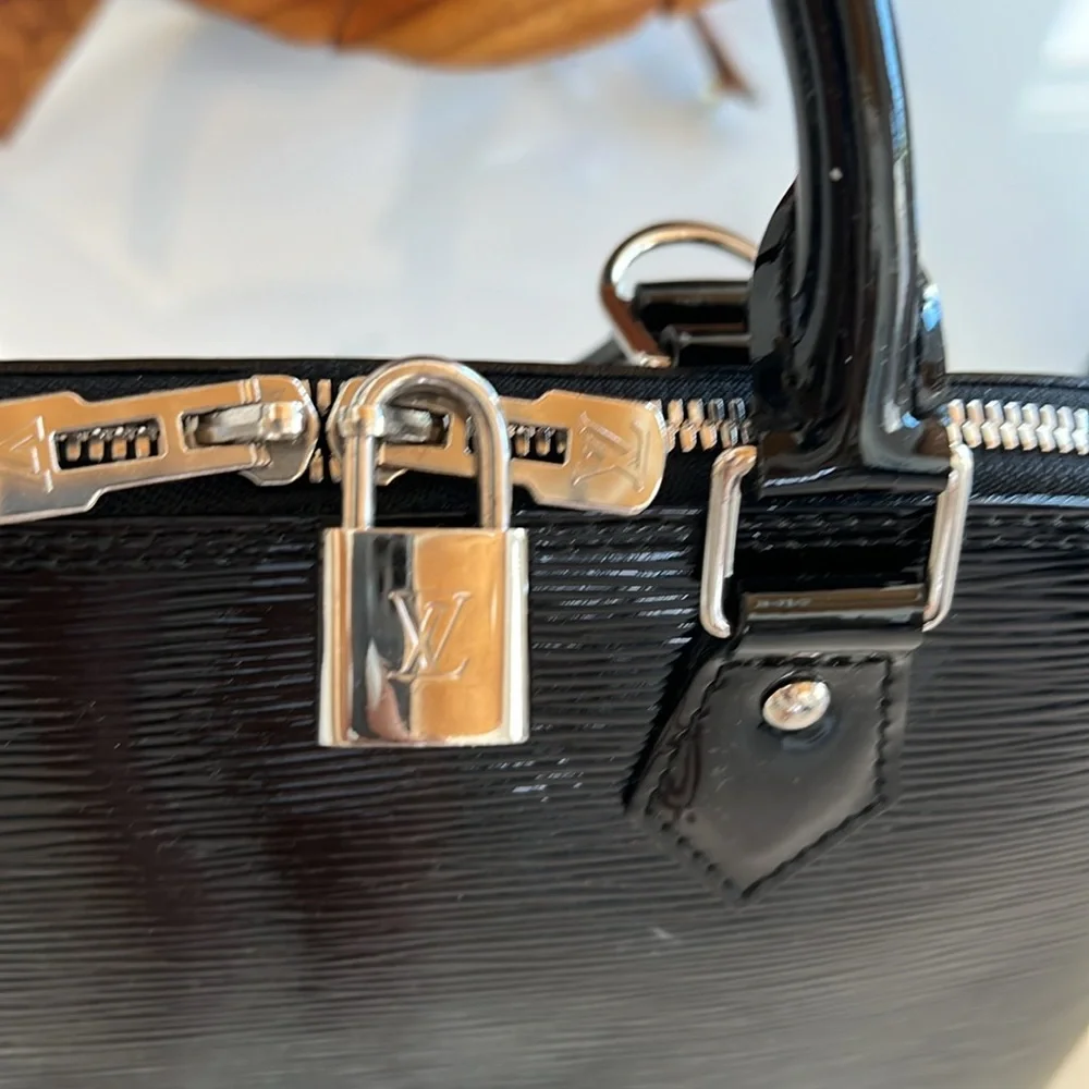 authentic $2850 Louis Vuitton Epi Electric Alma PM Satchel black patent leather